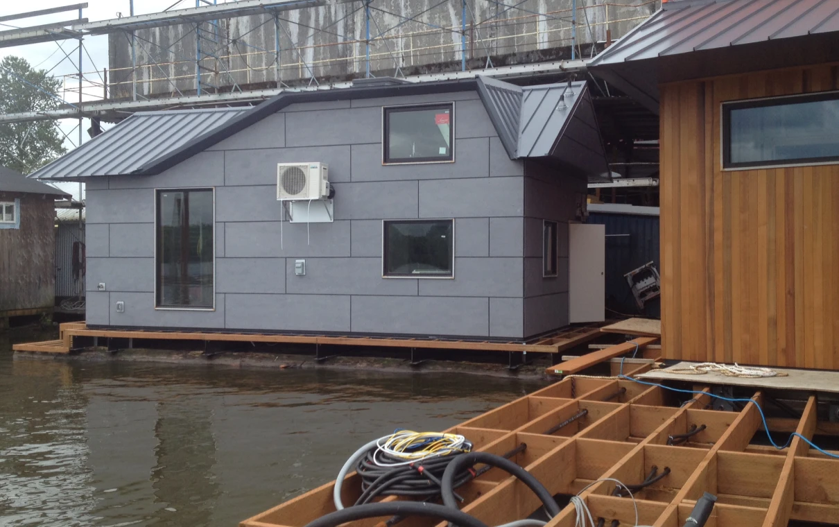 Houseboat under construction on water
